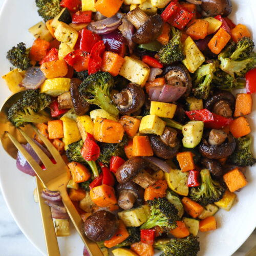 Peppers and vegetables roasting on the flat top